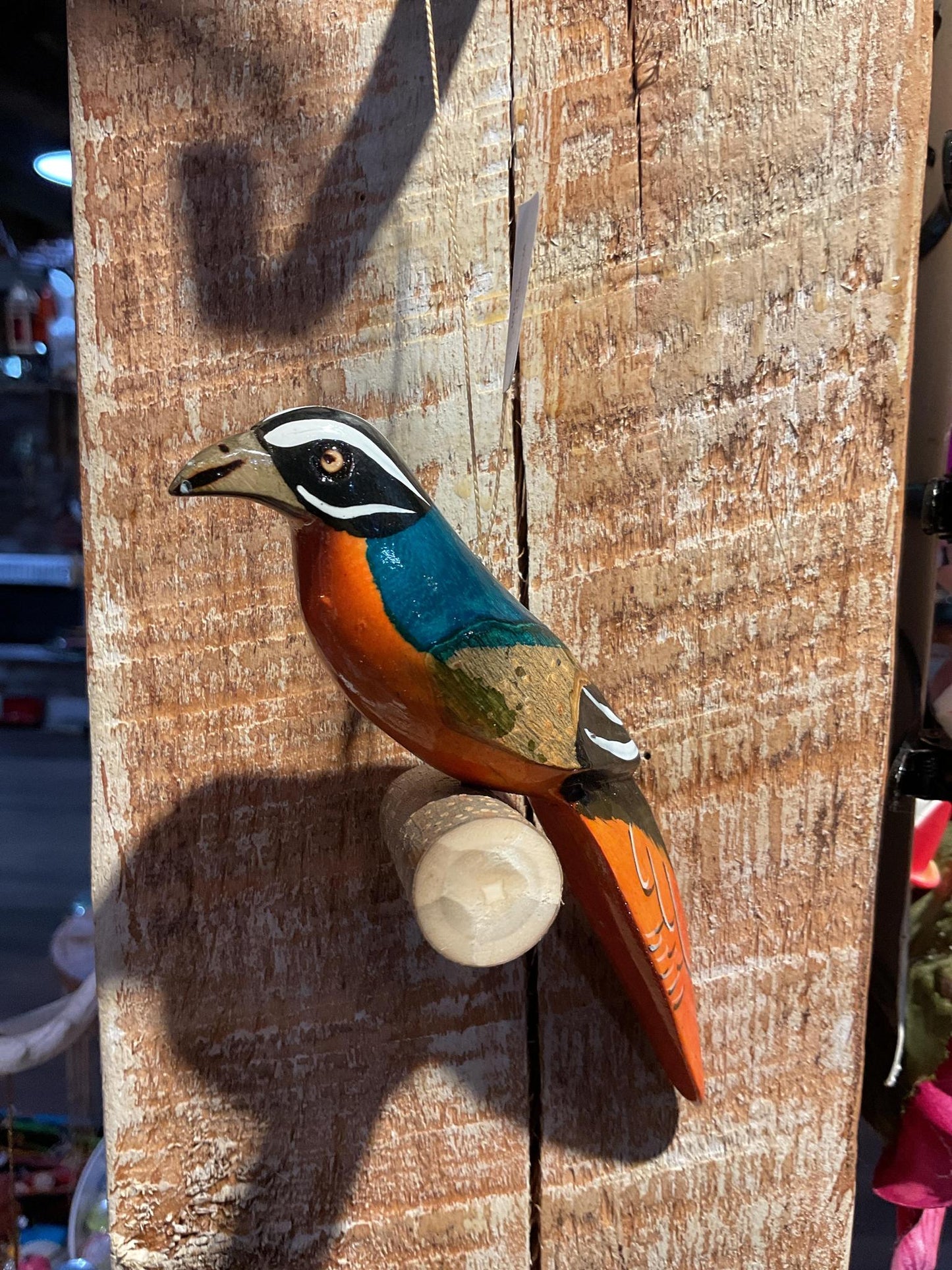 Wooden Birds on Perch