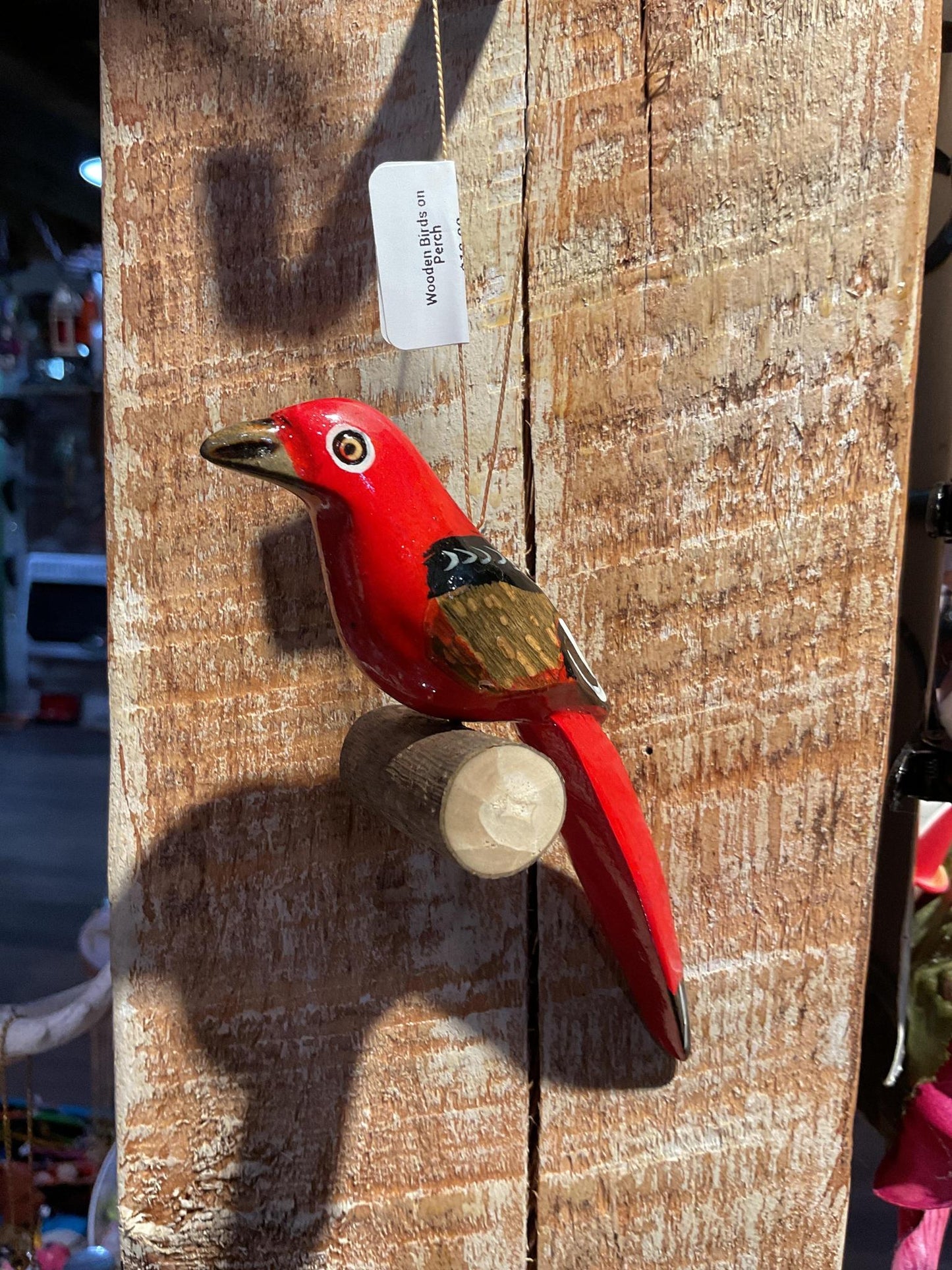 Wooden Birds on Perch