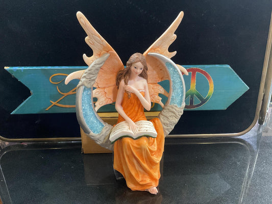 Fairy on Moon Reading 10” high
