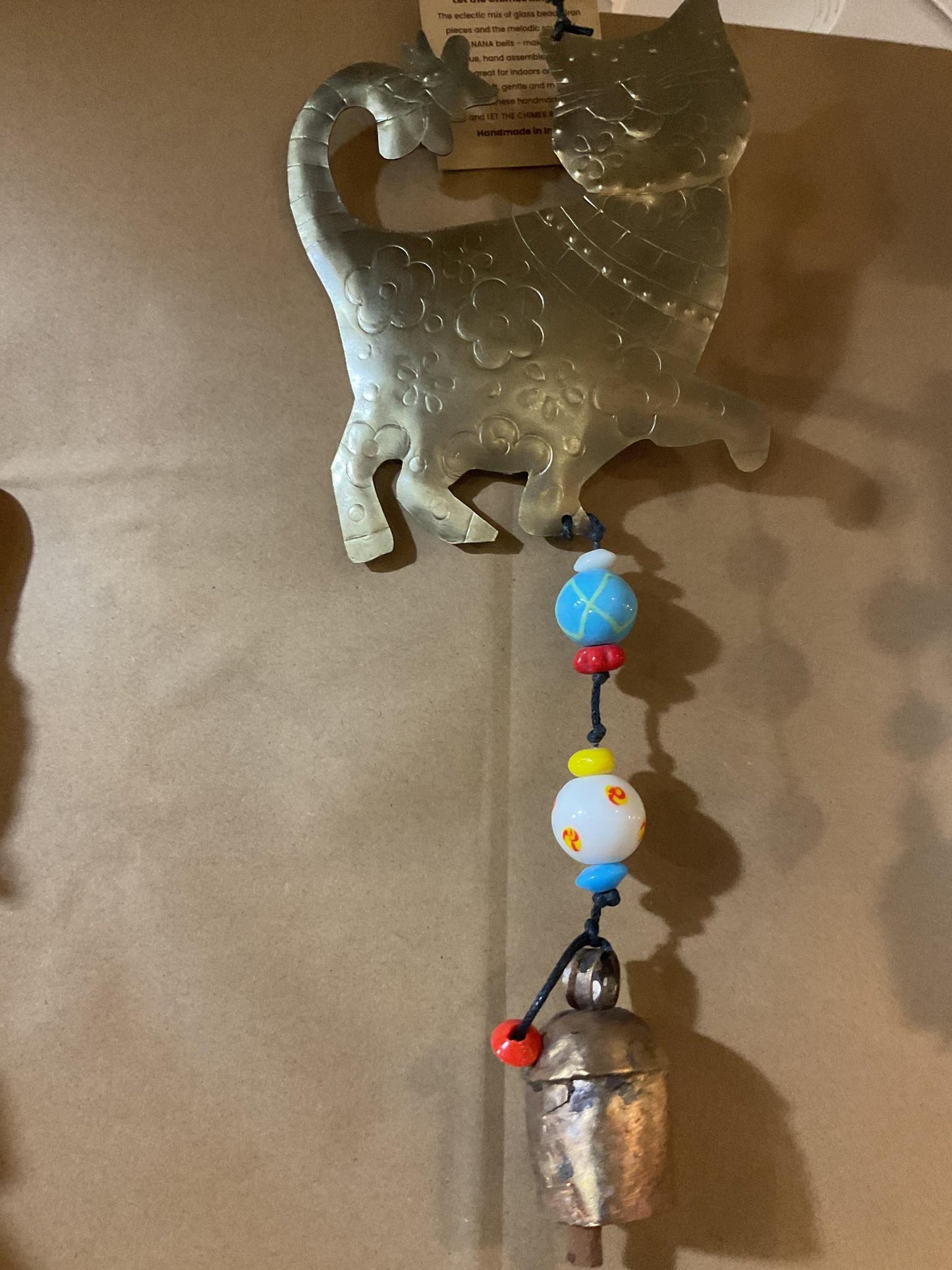 A Playful Cat/Beads and Bell
